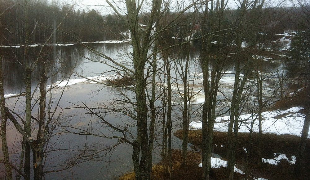 Ice cakes on the shore, and occasional drifting ice in the water. Photo taken Wednesday of this week by Debbie Norton of Upper Oxbow Adventures