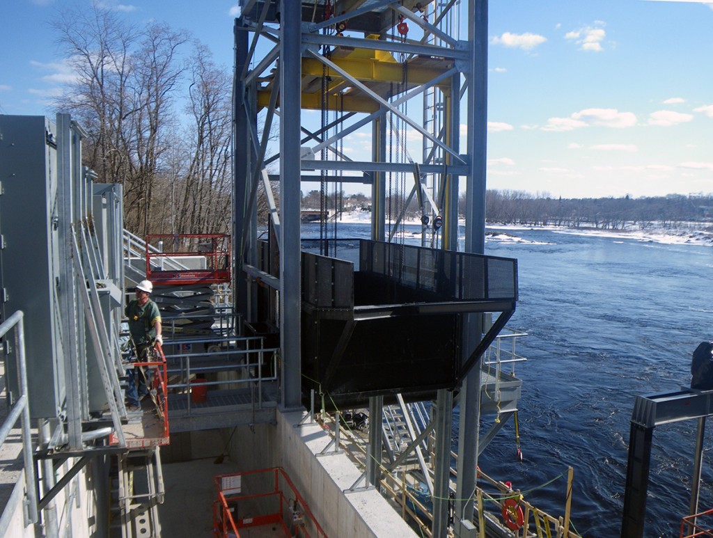 This photo is of the main hopper at Milford Dam. In the photo the hopper is at the top of it's lift to dump fish into the upper flume. From here, the fish will swim upstream to a collection/counting facility where Atlantic salmon broodstock will be collected. River herring will also be collected for stocking further upstream. American shad will be returned directly to the river. This facility and the Orono trap begin operation today, April 15. 2014. The image was taken about 10 days ago. (photo Don Dow/NOAA)